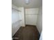 Walk-in closet with carpeted floors and wire shelving at 23671 W Wayland Dr, Buckeye, AZ 85326