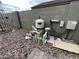 An outdoor view of the pool equipment, including a filter, pumps, and plumbing at 23671 W Wayland Dr, Buckeye, AZ 85326