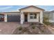 New single-story home with attached garage and landscaped front yard at 40105 W Elm Dr, Maricopa, AZ 85138