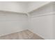 Spacious walk-in closet with ample hanging space at 40105 W Elm Dr, Maricopa, AZ 85138