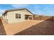 New construction home with covered patio and fenced backyard at 40115 W Elm Dr, Maricopa, AZ 85138