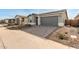 New single-story home with attached garage and landscaped front yard at 40115 W Elm Dr, Maricopa, AZ 85138