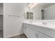 Elegant bathroom boasting double sinks and white cabinets at 40090 W Elm Dr, Maricopa, AZ 85138