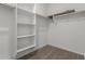 Bright, spacious closet with ample shelving and hanging rods at 40090 W Elm Dr, Maricopa, AZ 85138