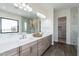 Beautiful bathroom with double vanity, quartz countertops, and a walk-in shower at 9626 E Bunny Ear Ln, Gold Canyon, AZ 85118