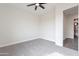 Empty bedroom featuring carpet flooring and a view to a bathroom at 9626 E Bunny Ear Ln, Gold Canyon, AZ 85118