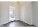 Bright foyer with a modern front door at 9626 E Bunny Ear Ln, Gold Canyon, AZ 85118