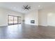 Spacious living room with a fireplace and tile floors at 9626 E Bunny Ear Ln, Gold Canyon, AZ 85118