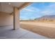 Covered patio view showcasing desert landscape and mountain scenery at 9626 E Bunny Ear Ln, Gold Canyon, AZ 85118