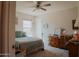 Charming bedroom with a comfortable bed and vanity area at 160 S Azteca Dr, Eloy, AZ 85131