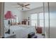 Bedroom with double bed, ceiling fan, and dresser at 160 S Azteca Dr, Eloy, AZ 85131