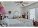 Bedroom with double bed, ceiling fan, and dresser at 160 S Azteca Dr, Eloy, AZ 85131