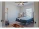 Bright bedroom featuring a comfortable bed and ceiling fan at 160 S Azteca Dr, Eloy, AZ 85131