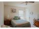 Cozy bedroom with double bed and wood nightstand at 160 S Azteca Dr, Eloy, AZ 85131