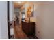 Inviting entryway with hardwood floors and a wooden dresser at 160 S Azteca Dr, Eloy, AZ 85131
