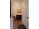 Bright hallway with wood floors and storage at 160 S Azteca Dr, Eloy, AZ 85131