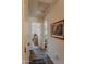 Hallway with access to bedrooms and other rooms at 160 S Azteca Dr, Eloy, AZ 85131
