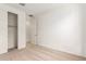 Spacious bedroom with carpeted floors and a closet at 40500 W Wade Dr, Maricopa, AZ 85138
