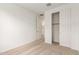 Simple bedroom with carpeted floor and a built-in closet at 40500 W Wade Dr, Maricopa, AZ 85138