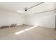 Bright and spacious garage with an attached door at 40500 W Wade Dr, Maricopa, AZ 85138