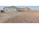 Empty backyard of a single-story house at 21641 N Daniel Dr, Maricopa, AZ 85138