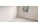Spacious bedroom with carpeted floor and window at 21641 N Daniel Dr, Maricopa, AZ 85138