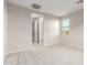 Spacious bedroom with carpeted floor and access to closet and bathroom at 21641 N Daniel Dr, Maricopa, AZ 85138