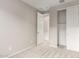 Bright bedroom featuring a closet and door at 21641 N Daniel Dr, Maricopa, AZ 85138