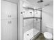 Updated bathroom with glass shower, modern fixtures, and white tile, for a clean and contemporary feel at 4925 N 73Rd St # 4, Scottsdale, AZ 85251