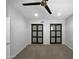 Spacious bedroom boasting large sliding door closets, neutral carpet, and updated lighting, creating a peaceful space at 4925 N 73Rd St # 4, Scottsdale, AZ 85251