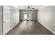 Bright and airy living room with light wood floors, a ceiling fan, and access to an outdoor space at 4925 N 73Rd St # 4, Scottsdale, AZ 85251