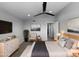 Comfortable main bedroom with a ceiling fan, closet, and an ensuite bathroom at 4925 N 73Rd St # 4, Scottsdale, AZ 85251