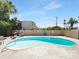 Refreshing community pool area with lounge chairs and shade, perfect for relaxing on a sunny day at 4925 N 73Rd St # 4, Scottsdale, AZ 85251