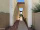 Exterior walkway between units with desert landscaping and sunny exposure at 4925 N 73Rd St # 4, Scottsdale, AZ 85251