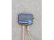 Close up of the home's outdoor Rain Dial Irrigation Timer that allows for automated watering and smart water use at 16222 W Talara Way, Surprise, AZ 85374