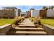 Beautiful home exterior featuring a textured facade, desert landscaping, and a inviting walkway at 4350 N Jokake Dr, Scottsdale, AZ 85251