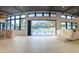 Open living area featuring floor-to-ceiling windows and access to the backyard pool area at 4350 N Jokake Dr, Scottsdale, AZ 85251