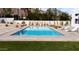 Inviting swimming pool surrounded by desert landscaping and lounge chairs at 4350 N Jokake Dr, Scottsdale, AZ 85251