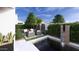 Landscaped backyard oasis with a pool, waterfall feature, and seating area at 1535 W Wagon Wheel Dr, Phoenix, AZ 85021