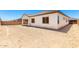 The backyard offers a covered patio at 20262 W Hollyhock St, Buckeye, AZ 85396