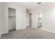 Bedroom leading to ensuite bathroom and walk in closet at 20262 W Hollyhock St, Buckeye, AZ 85396