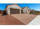 Charming single-story home featuring a two-car garage and well manicured brick driveway at 20262 W Hollyhock St, Buckeye, AZ 85396