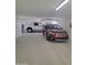 Large three car garage providing ample space for vehicle storage and other belongings at 9710 W Campana Dr, Sun City, AZ 85351