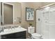 Modern bathroom with single vanity and walk-in shower at 7054 E Ingram St, Mesa, AZ 85207