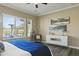 Main bedroom with a comfortable bed and large windows at 7054 E Ingram St, Mesa, AZ 85207