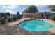 Inviting community pool with shaded seating at 2300 E Magma Rd # 126, San Tan Valley, AZ 85143