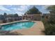 Community pool with covered patio area at 2300 E Magma Rd # 126, San Tan Valley, AZ 85143
