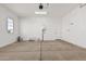 Unfinished garage with extra storage space at 16355 W Avenida Del Sol --, Surprise, AZ 85387