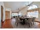 Elegant dining room with hardwood floors and stained glass window at 10913 W Chino Dr, Sun City, AZ 85373