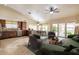 Kitchen features dark wood cabinets and stainless steel appliances at 10913 W Chino Dr, Sun City, AZ 85373